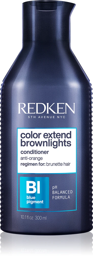 Redken Color Extend Brownlights tint conditioner neutralizes the brassy undertones