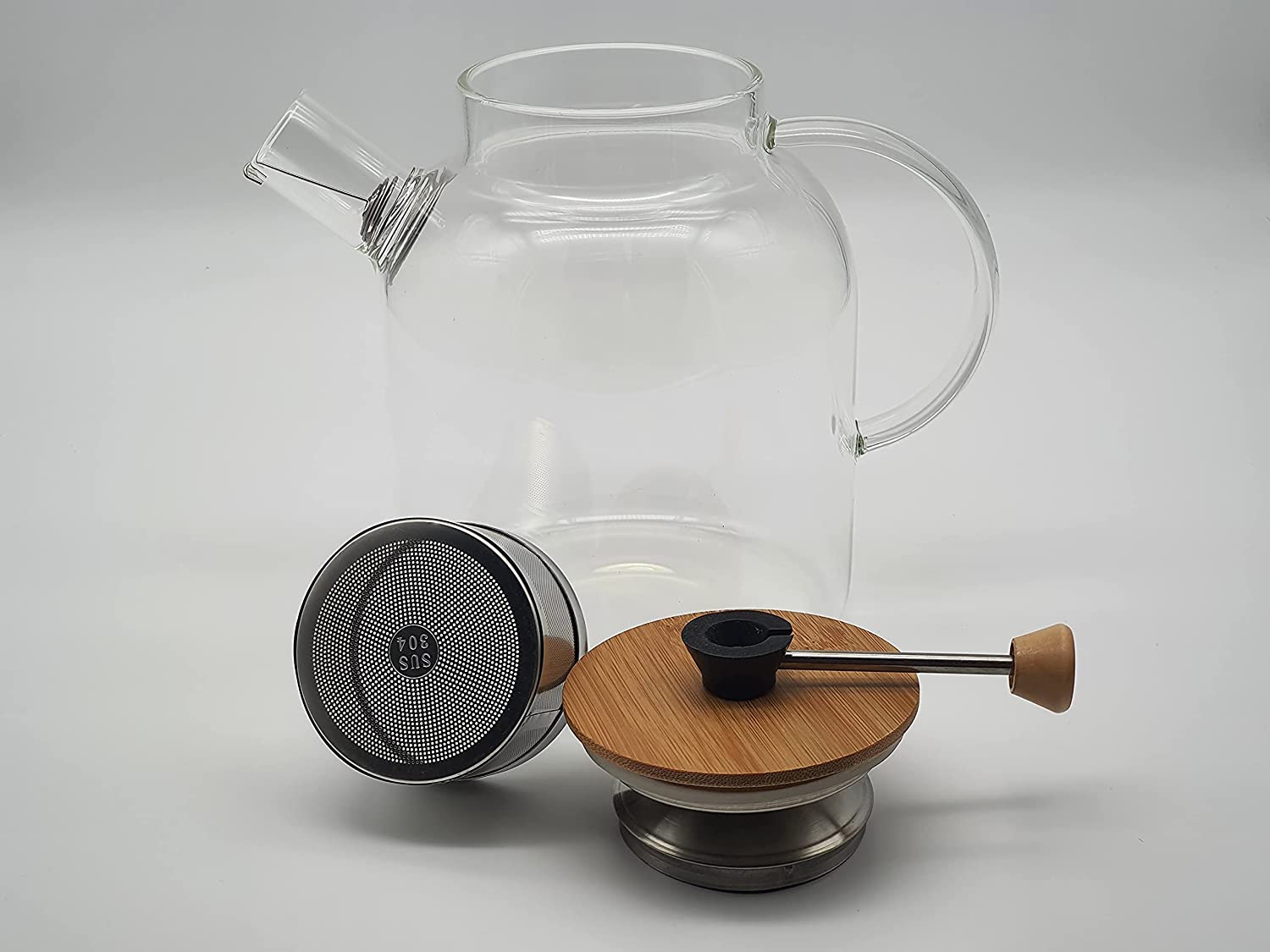 Naturic Glass Teapot with Strainer - 1.6 L Teapot with Strainer Insert - Teapot with Lifting and Lowering Function - Glass Jug with Strainer Insert - Lid and Stainless Steel Strainer Removable