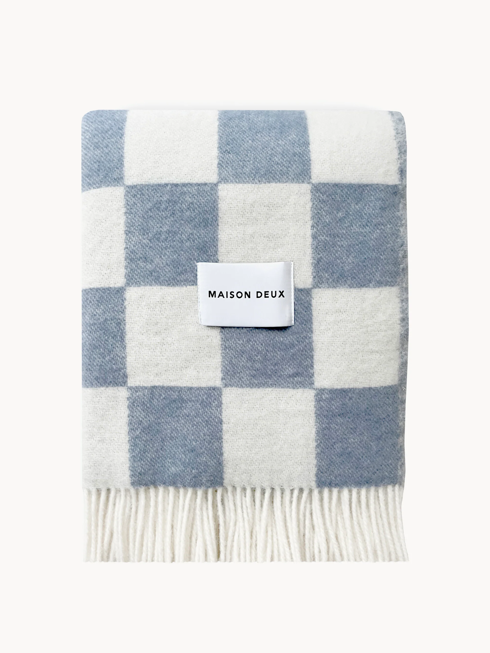 Maison Deux Wool throw blanket with checkerboard pattern